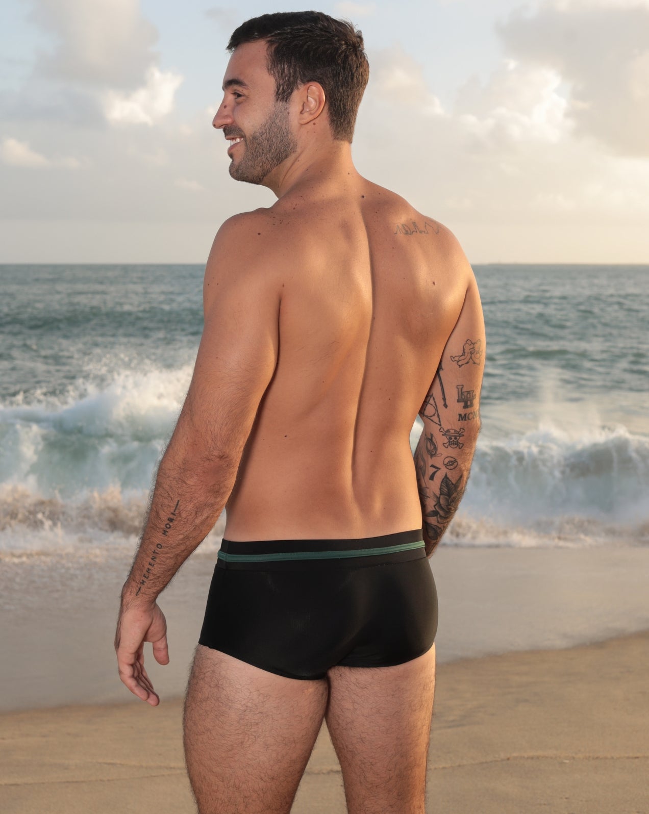 Sunga preta com faixa verde